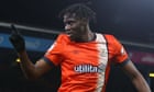 ‘Say it to his face’: Luton call out racist abuse of Elijah Adebayo