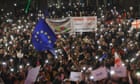 Protests in Georgia over disputed vote as PM threatens to ban opposition