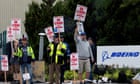 Union urges striking Boeing workers to back improved pay offer