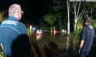 Children rescued after clinging to tree for hours in Queensland flood waters