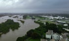 North Queensland floods: hundreds evacuated, dozens rescued as 1.2m of rain dumped in some areas