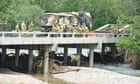 Towns cut off by Queensland floods warned against panic-buying as premier vows ‘resilient’ rebuild